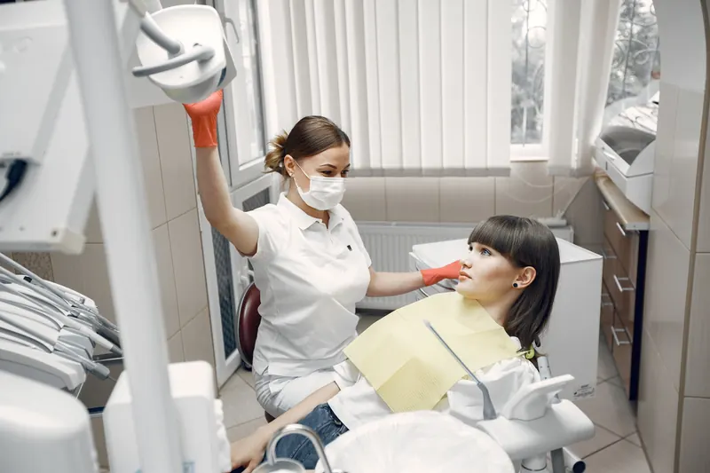 Dentist examining a patient in a modern dental clinic